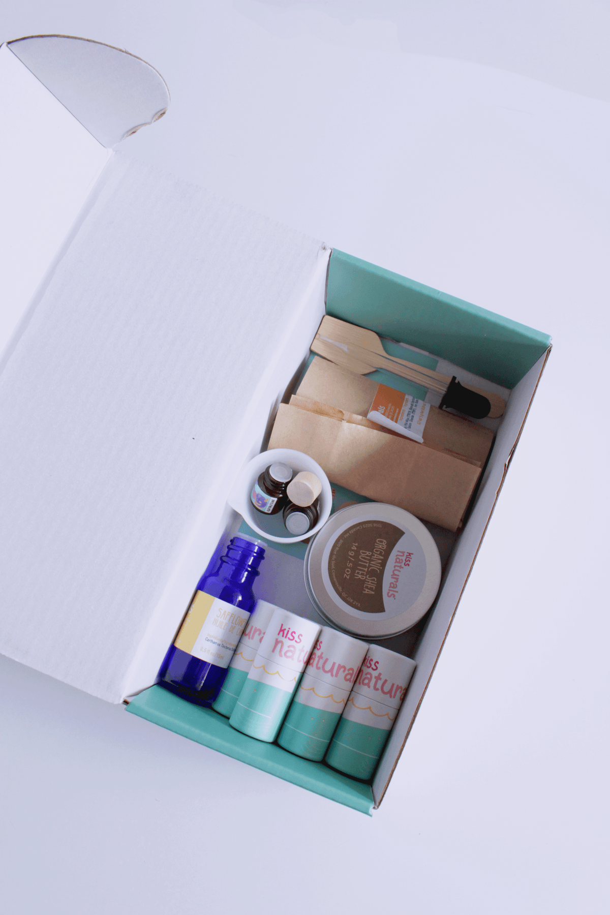 Inside the Kiss Naturals lip balm kit, ready to make