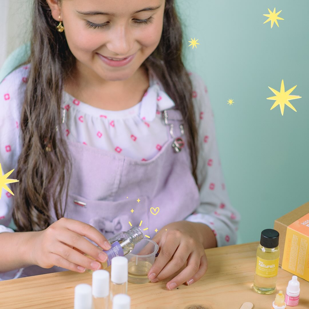Girl making her own lava lip gloss with a DIY kit