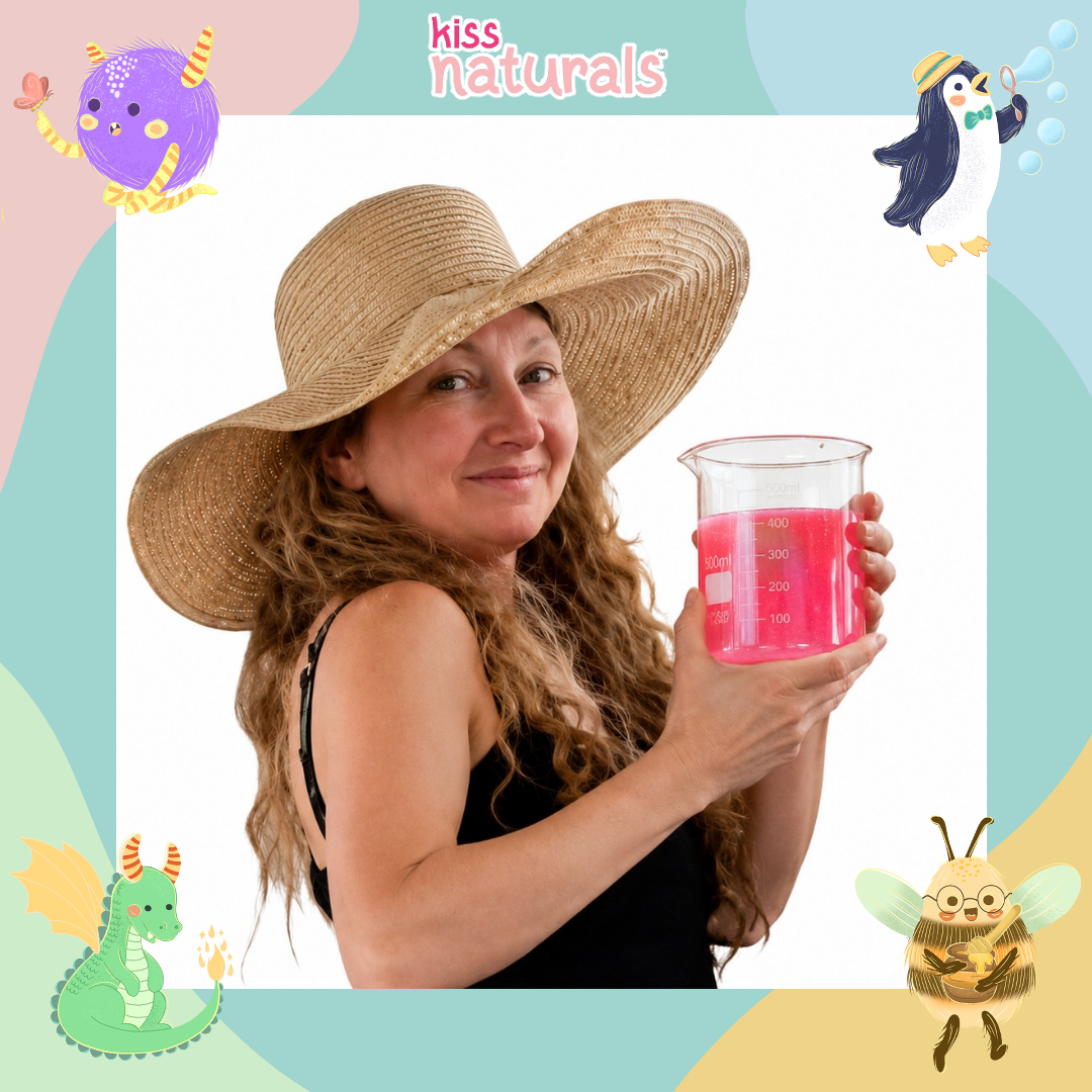 Melanie Ewing, Production
Manager at Kiss Naturals, holding a beaker of natural lip gloss