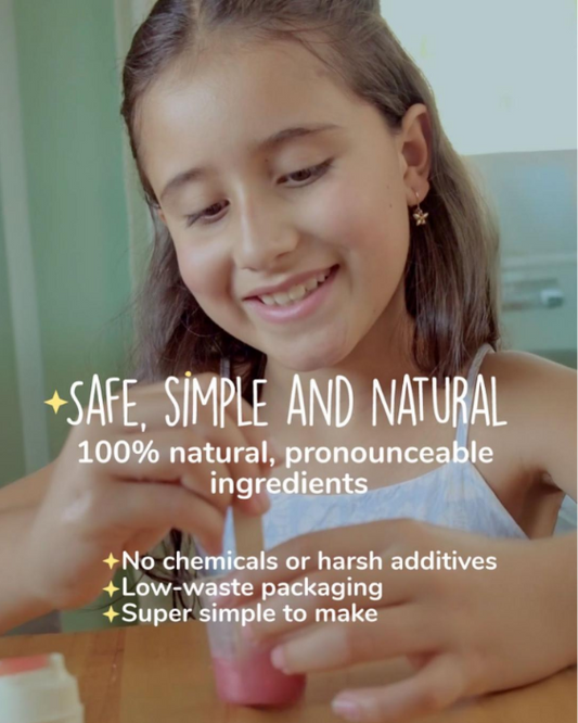 Happy girl with her homemade natural lip balm